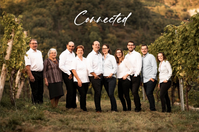 Text 'Connected' is above the photo of the Donabaum family in the vineyard